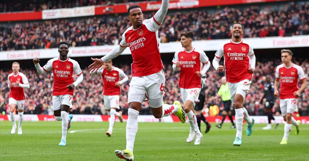 Gabriel celebrates scoring his first goal with teammates against Crystal Palace in the Premier League.