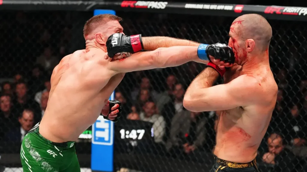 TORONTO, ONTARIO - JANUARY 20: (L-R) Dricus Du Plessis of South Africa punches Sean Strickland in a UFC middleweight championship bout during the UFC 297 event at Scotiabank Arena on January 20, 2024 in Toronto, Ontario.